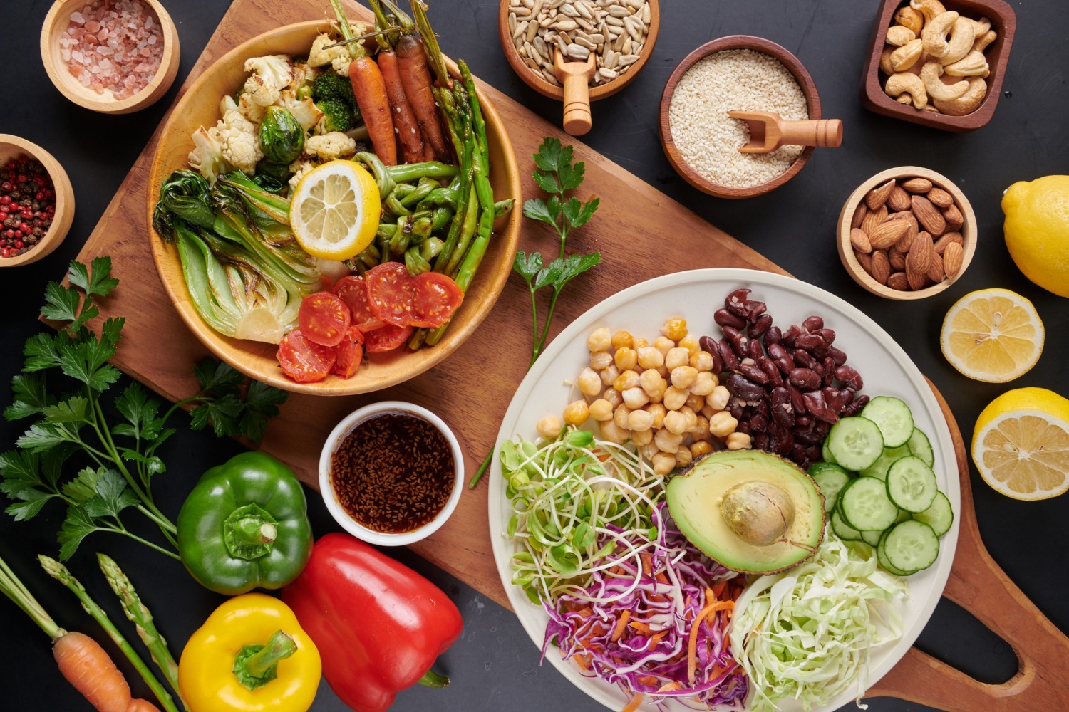 Colourful balanced meals with vegetables, pulses, avocado, nuts and seeds